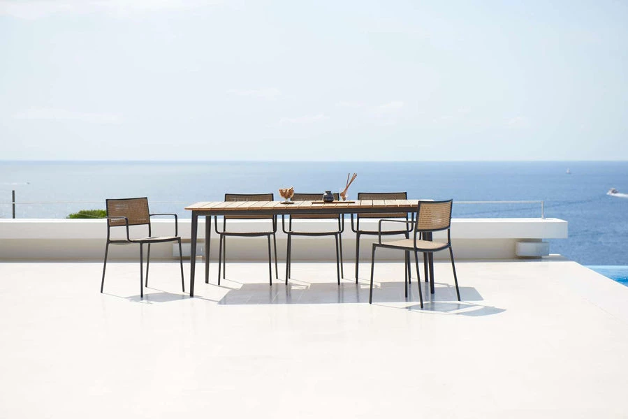 Cane-Line Less Stackable Dining Armchair 12 Cane-Line Less Stackable Dining Armchair