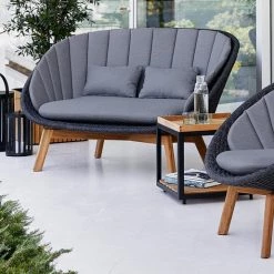 Cane-Line Peacock Fiber Lounge Chair With Teak Legs