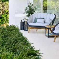 Cane-Line Peacock Outdoor Lounge Chair With Teak Legs In Soft Rope