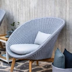 Cane-Line Peacock Outdoor Lounge Chair With Teak Legs In Soft Rope